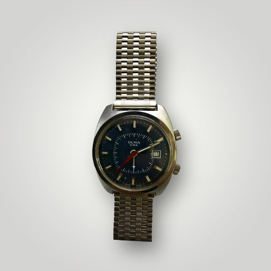 Montre vintage OLMA VOX – Suisse | Alarme mécanique & date