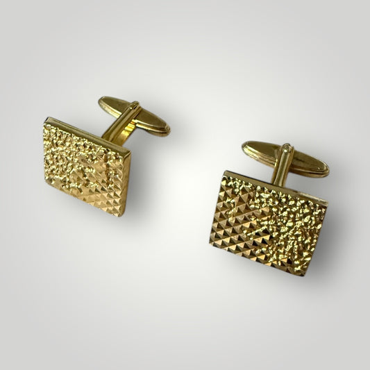 Boutons de manchette dorés