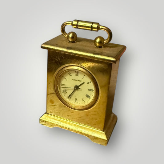 Miniature horloge Bucherer dorée